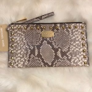 MK “EMBOSSED STUDDED ZIP CLUTCH” WRISTLET
